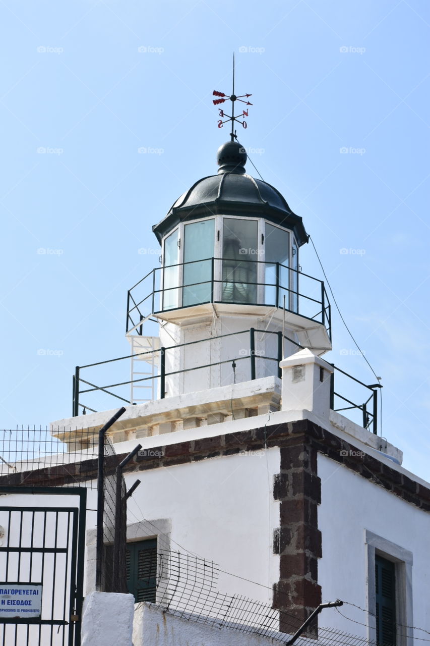 light house in santorini greece