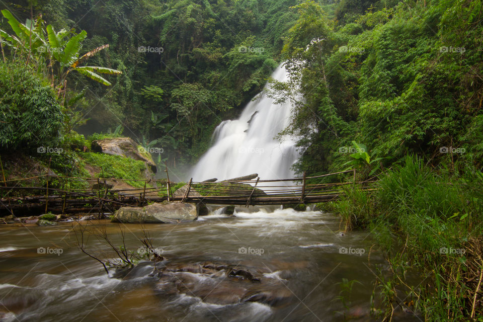 Big and beautiful waterfall in forest