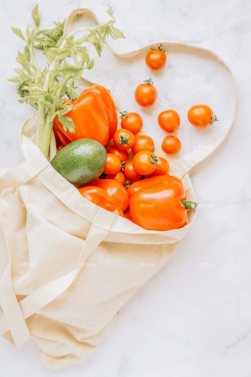 Vegetables in reusable linen bag.