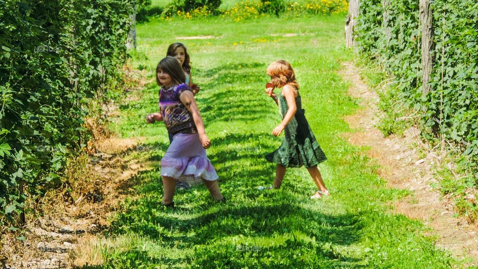 Girl playing in farm land