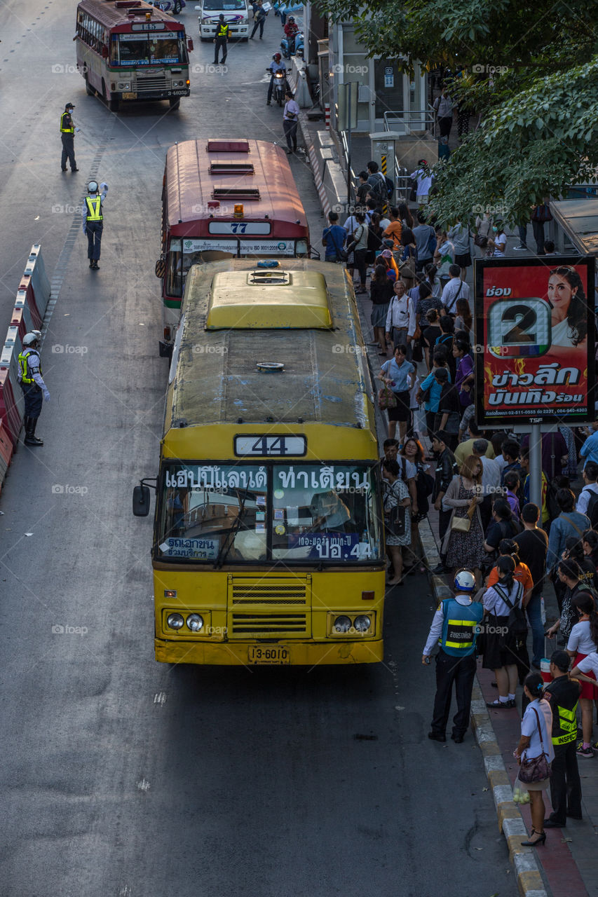 Public bus station in the rush hour in Bangkok Thailand 