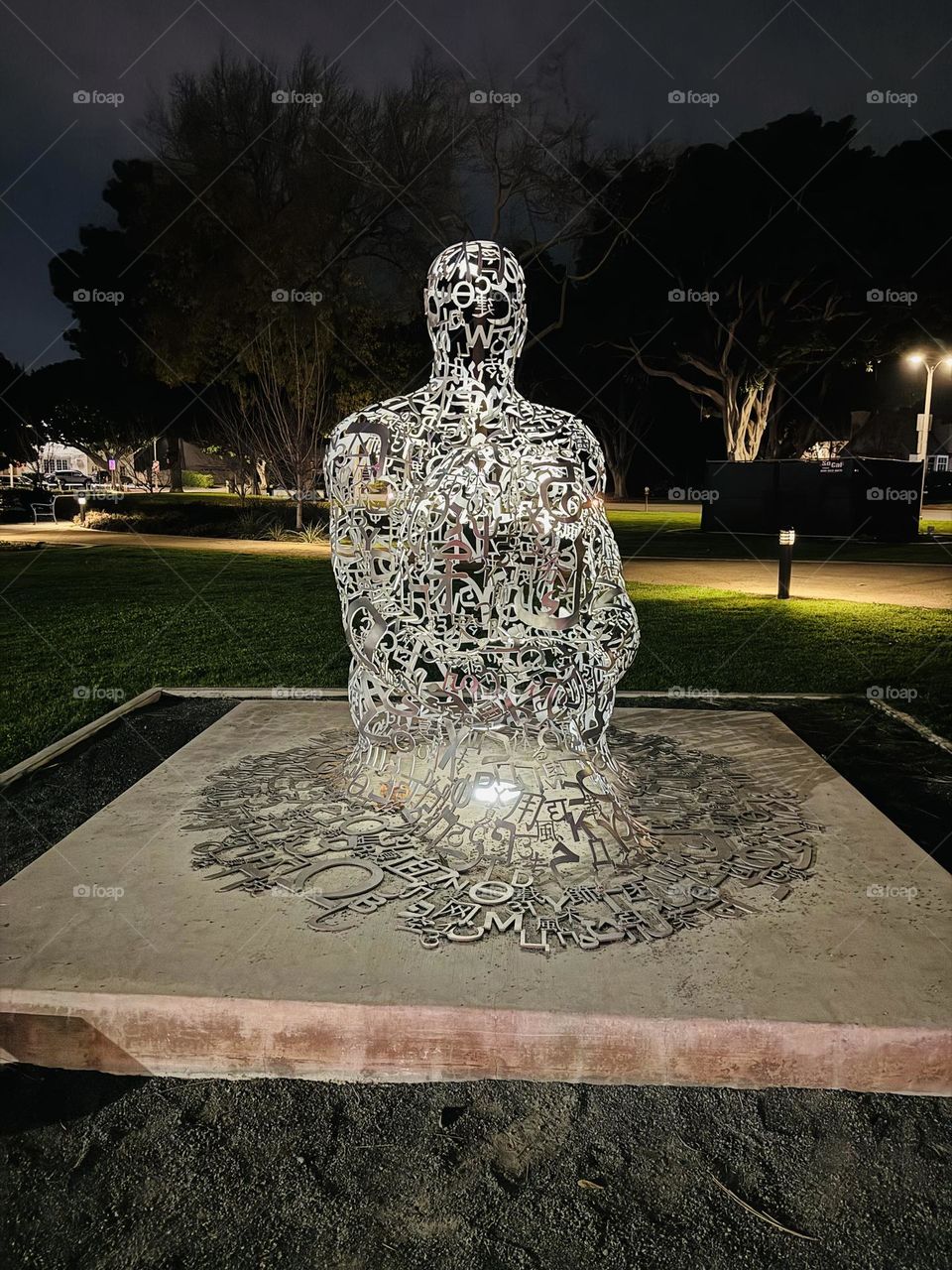 Art Statue, Aluminum Letters made into a man sitting 