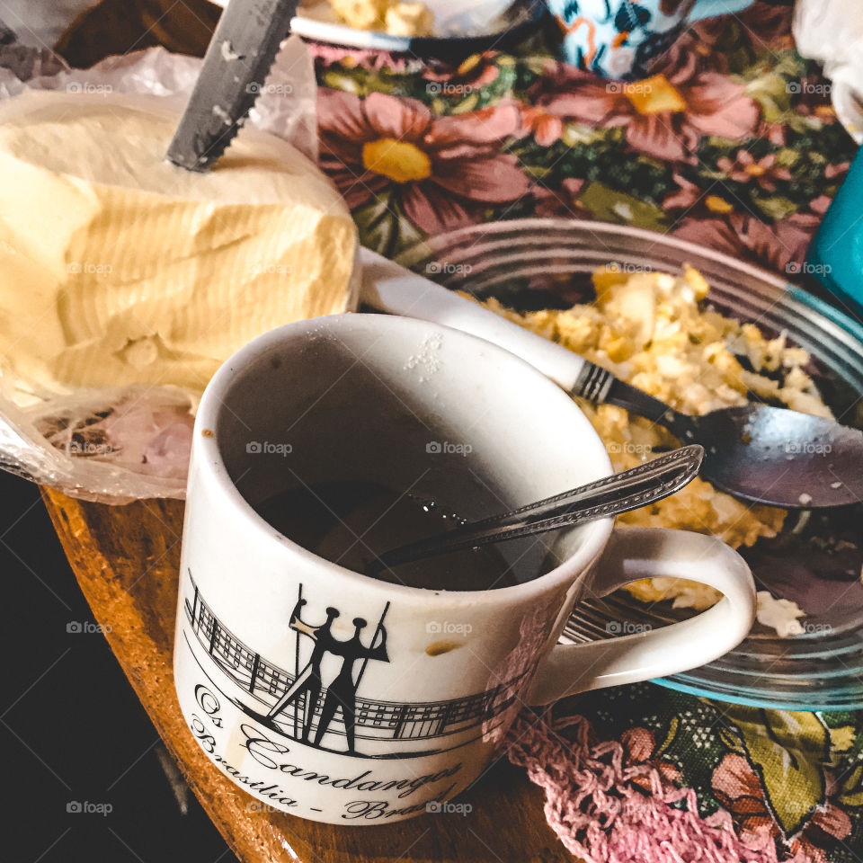 Brazilian coffee with cheese and a scrambled egg