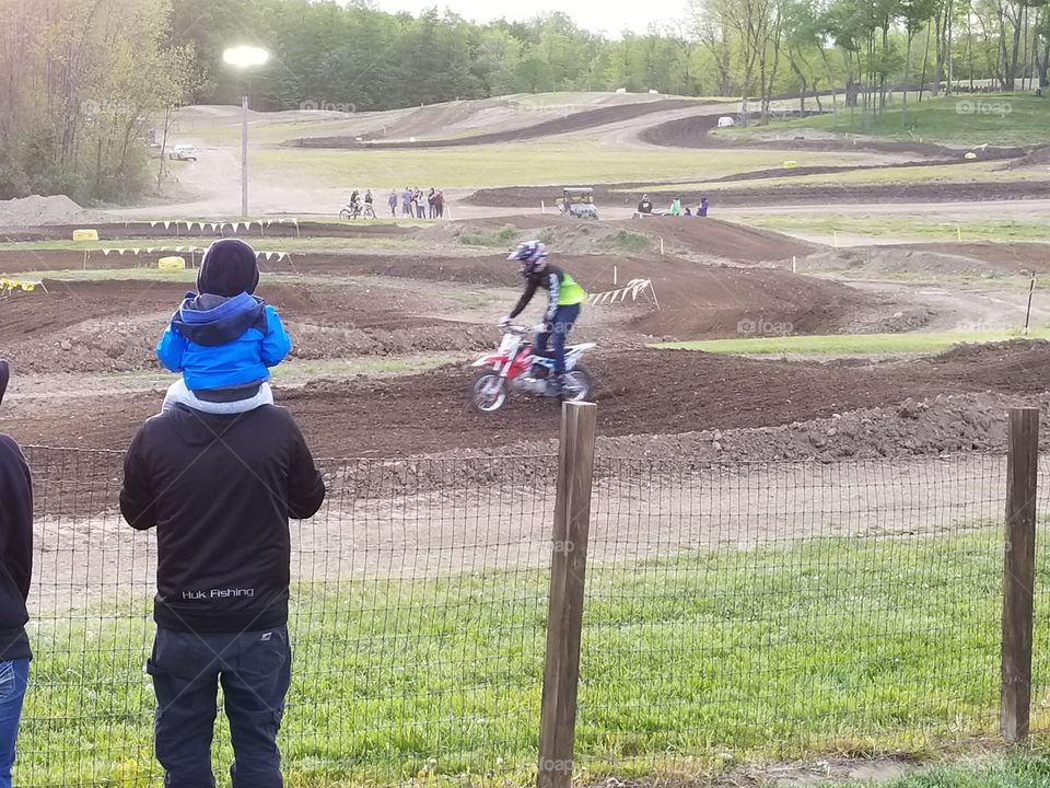 daddy and son at dirt bike races