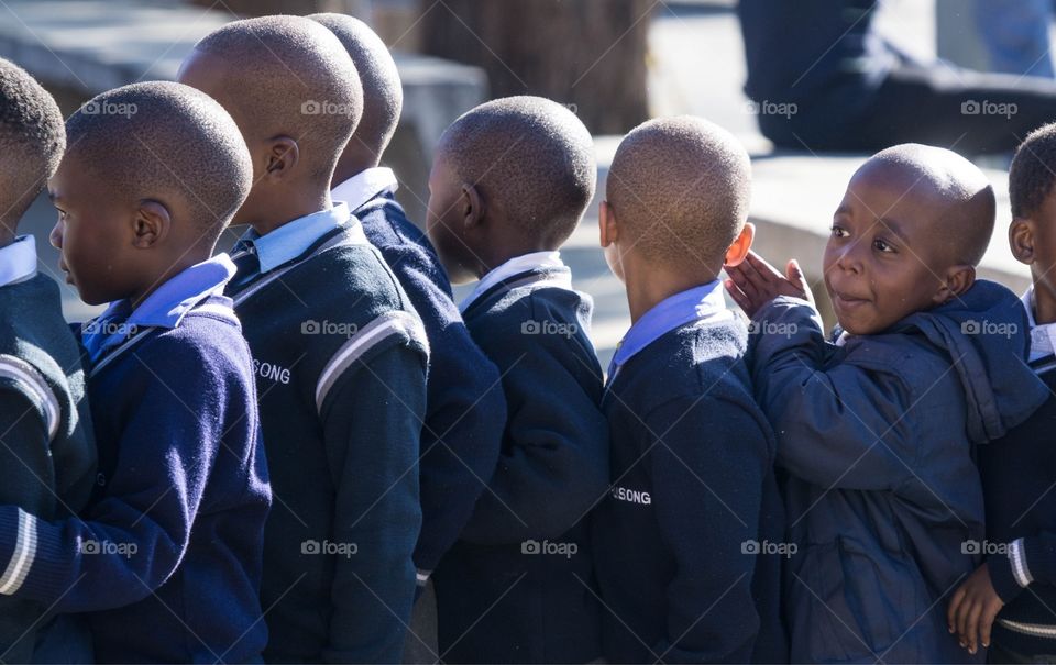 South African schoolboys i. queue