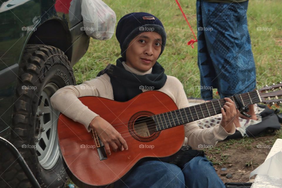 playing guitar