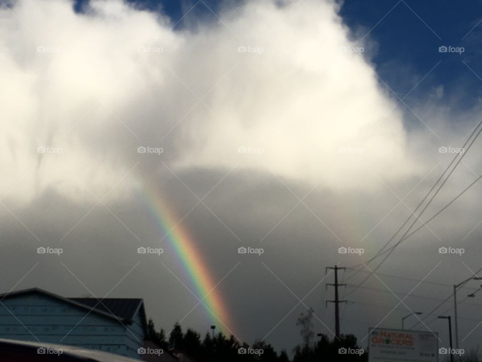 Rainbow and storm clouds 