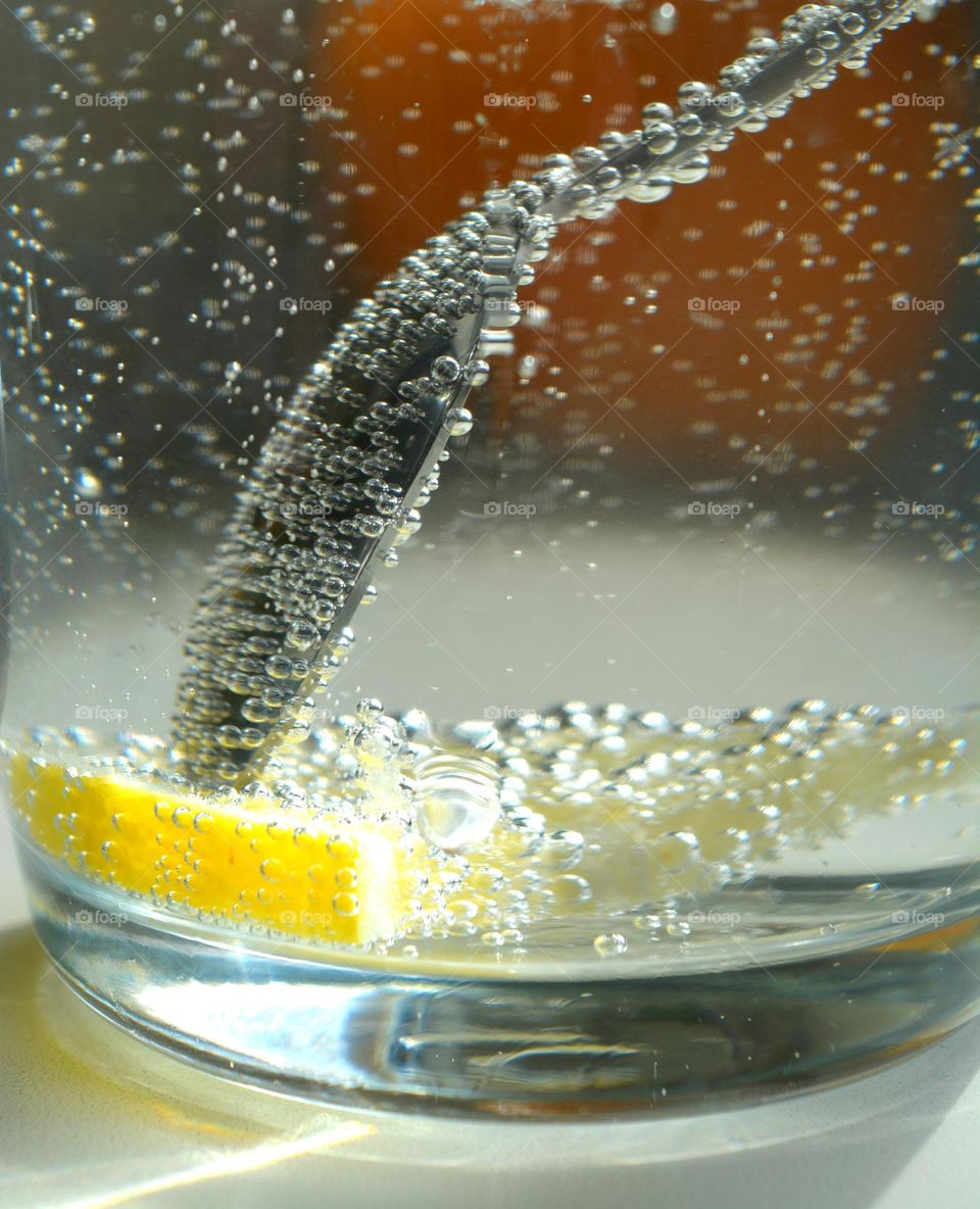 water with lemon close up beautiful texture