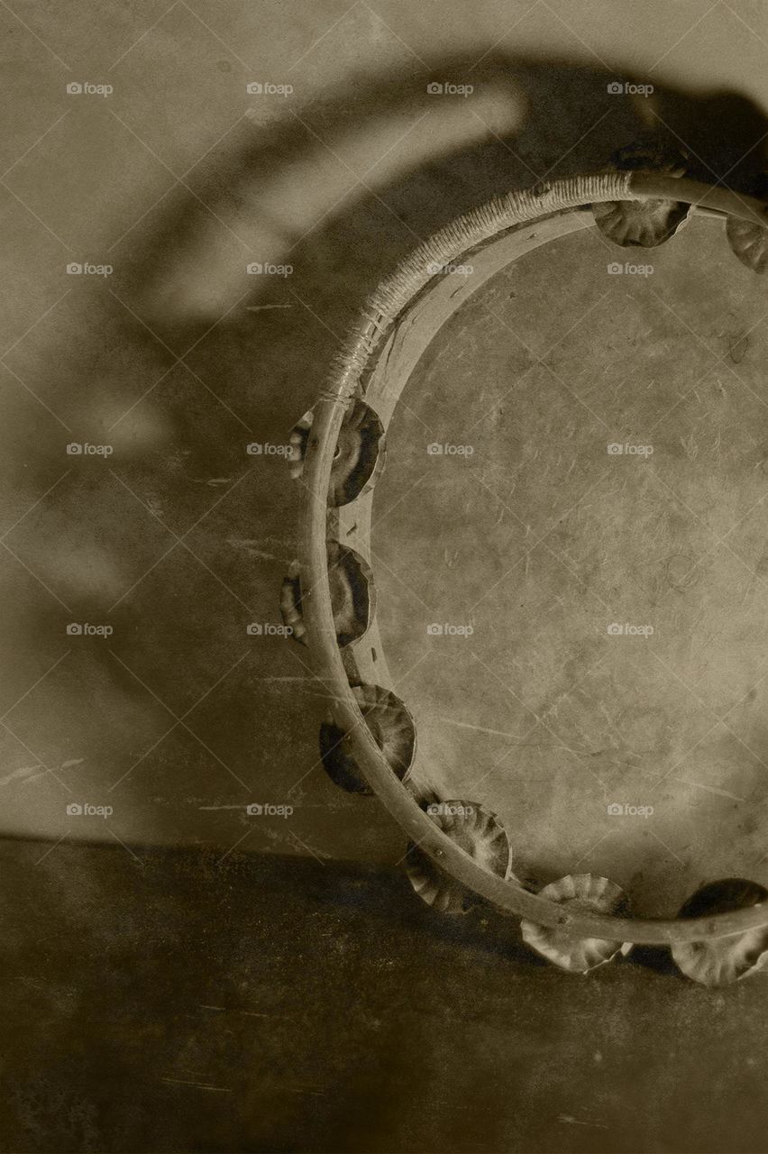My great-grandmother’s Salvation Army tambourine she used when she was a young girl. A truly vintage piece of family history lovingly placed in a vintage photo style in sepia tones. ❤️