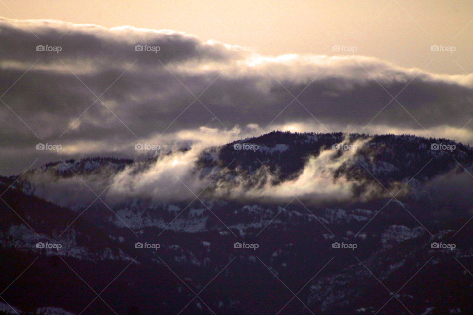 Everchanging West Coast sky! The clouds moved rapidly over the tops and through the valley creating beautiful wisps of dancing clouds.