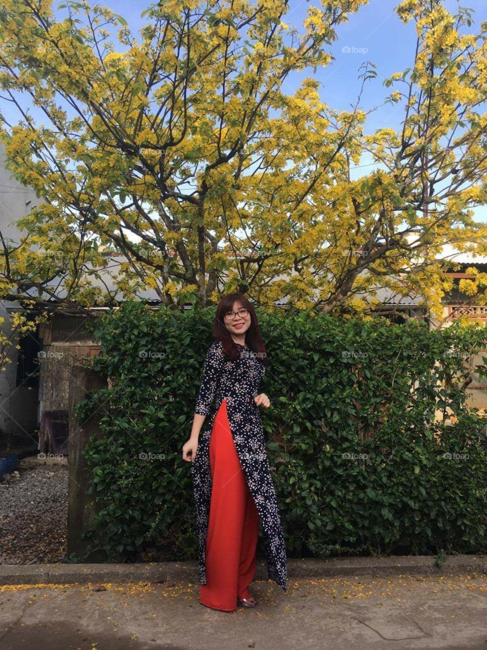 Pring in Vietnam with AO DAI traditional and apricot blossom