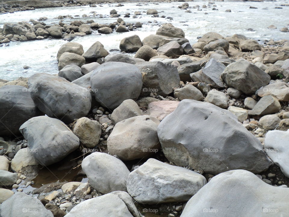 photos of river water flow with rocks