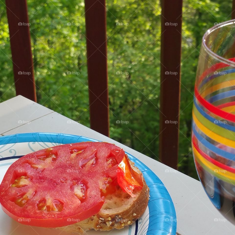 tomato sandwich . we drove to the nearest home Depot today. on the 20 minute mountain drive, we passes several produce stands. those babies made for a great picnic dinner on our deck