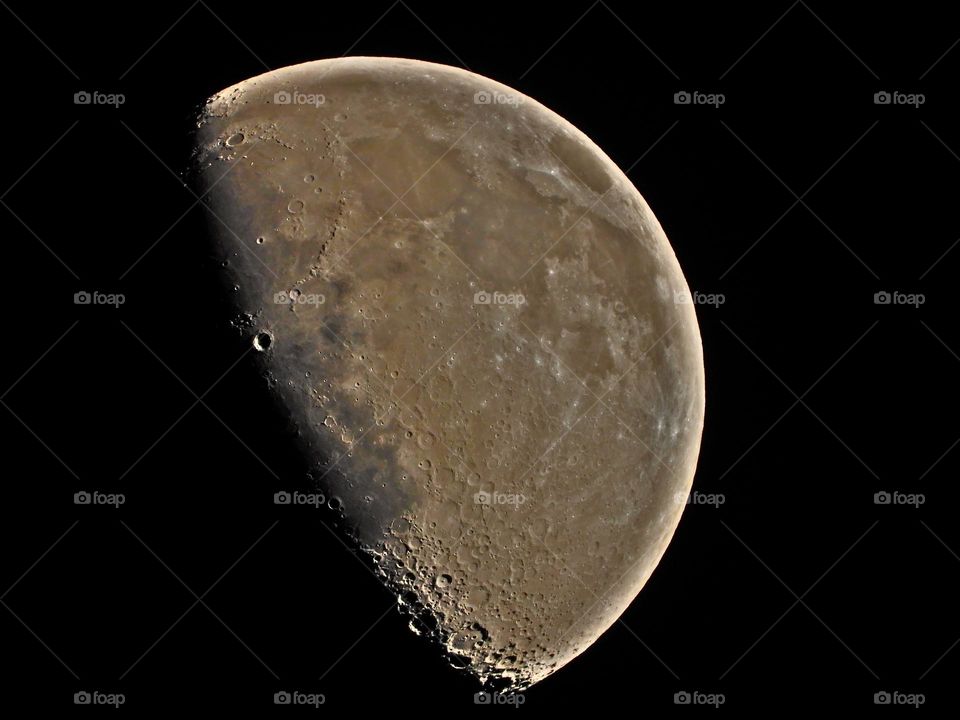The moon, craters, halo around edge