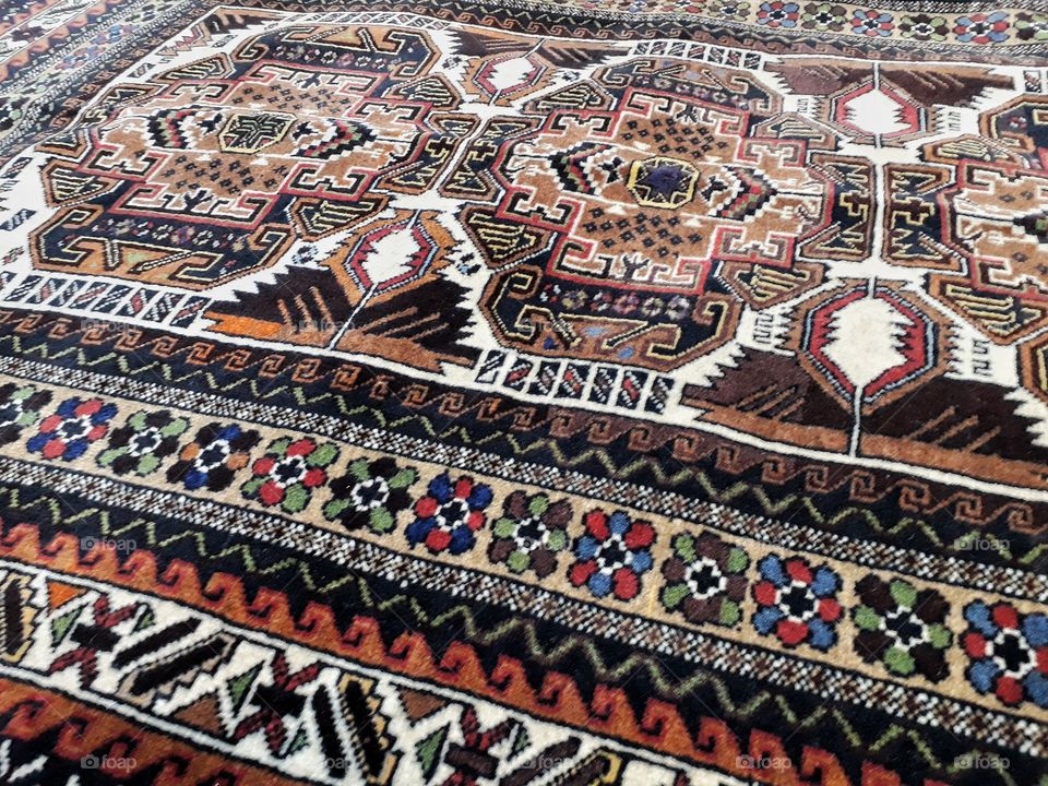 old Afghan wool carpet from a carpet bazar