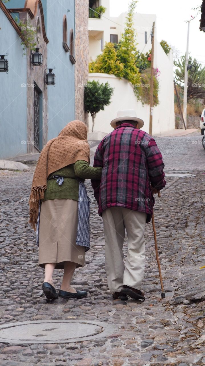 Old couple walking