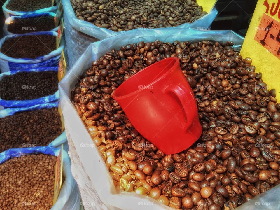 Red mug. . Took this picture when visited Tbilisi market. I sensed a smell of coffee and then saw this shot. Pulled out my phone and here we go.  