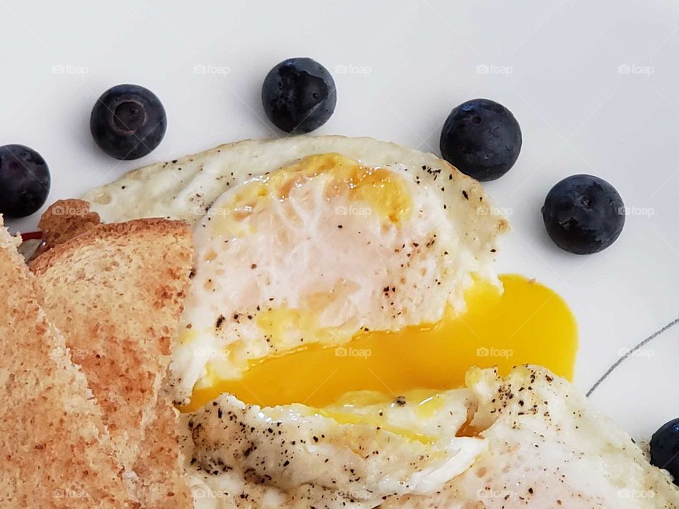 yolks spilling out of my egg