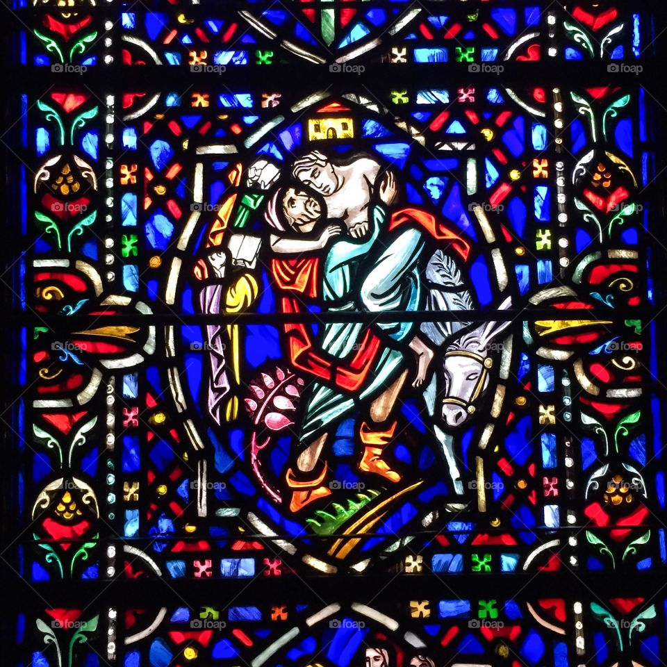 Parable of the Good Samaritan. Stained glass window at Westminster Presbyterian Church in Minneapolis, Minnesota 