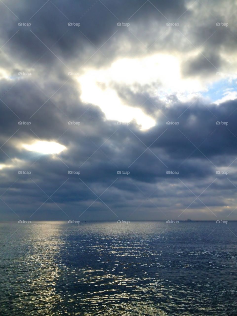 View of sea against cloudy sky