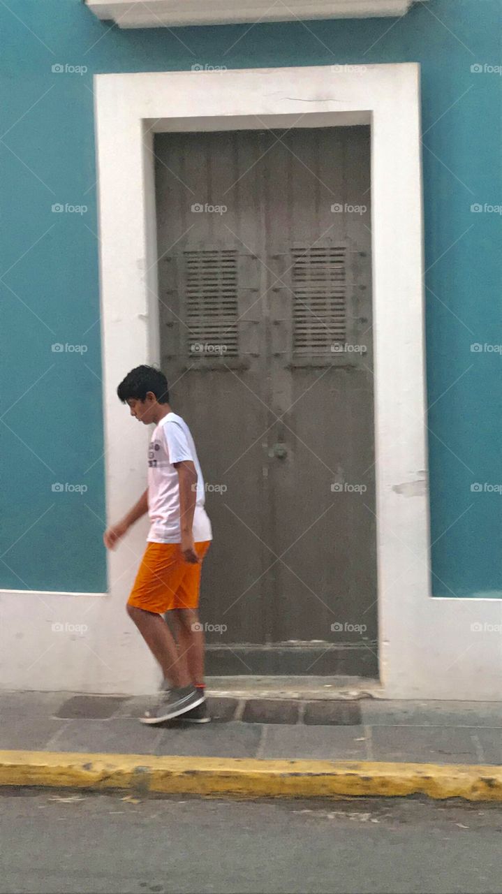 Historic walk through Old San Juan Puerto Rico. History, doors, sidewalk, clothing, trendy, boy, blue, tropical, island, outdoors, daylight, fit, walking, Taino 