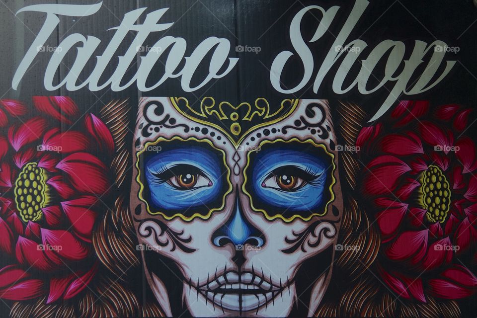 Promotional Sign Outside A Tattoo Shop in New York City.