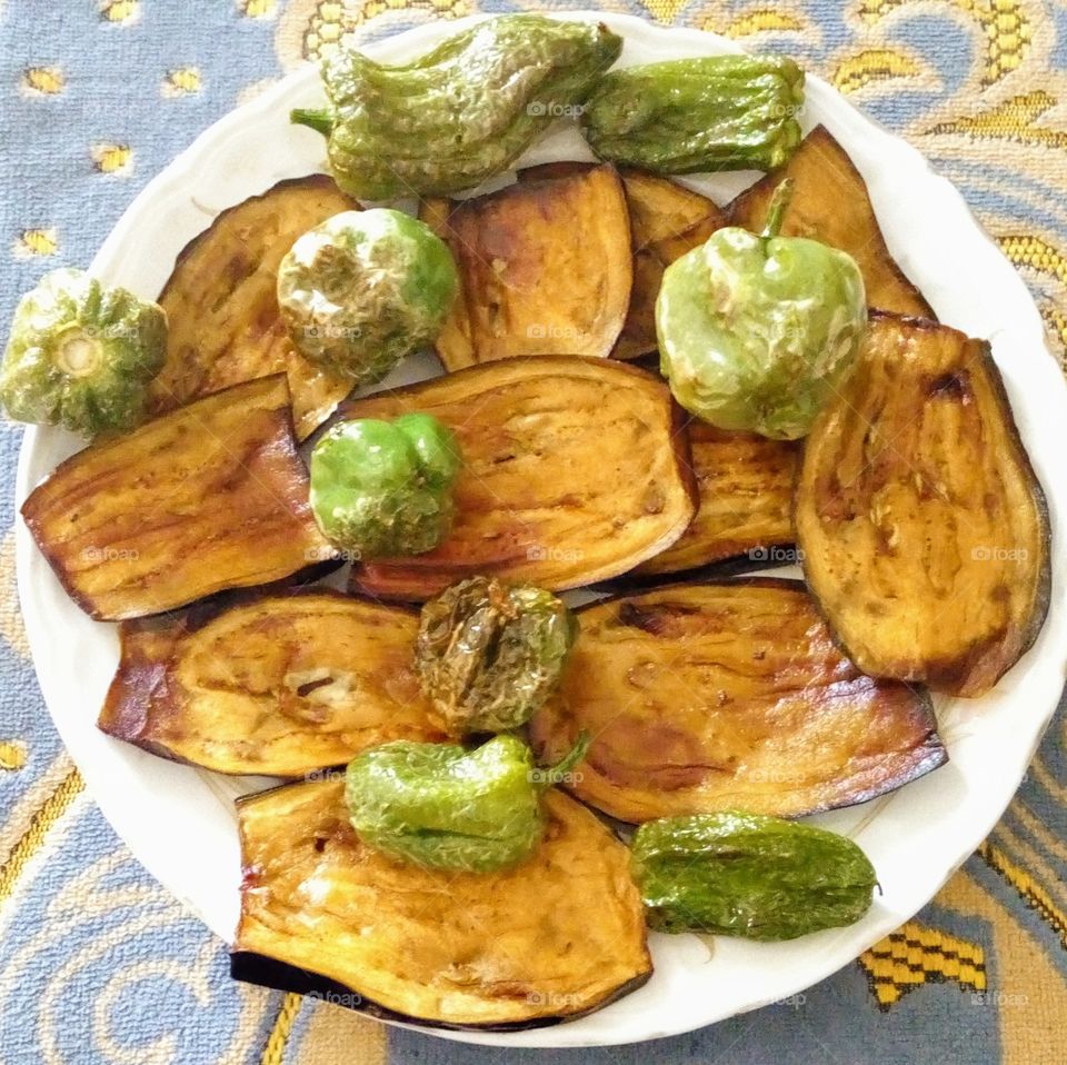 Fried eggplant and fried pepper of the best popular dishes in Egypt