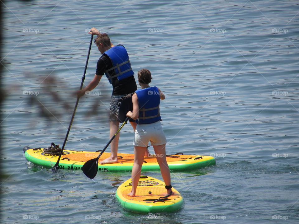 a couple paddling