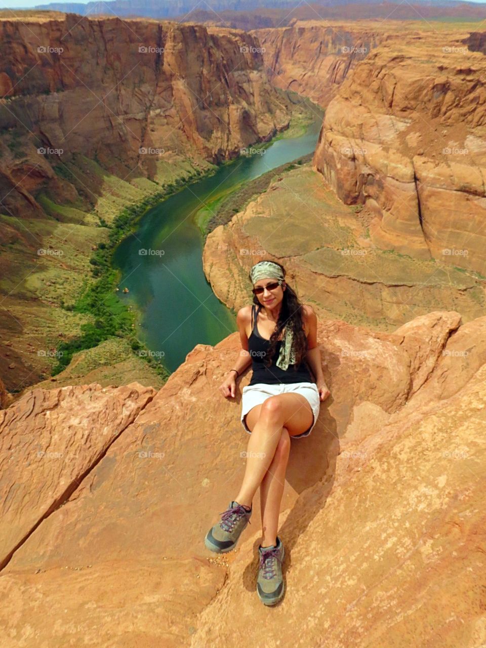 Woman relaxing on the canyon rock