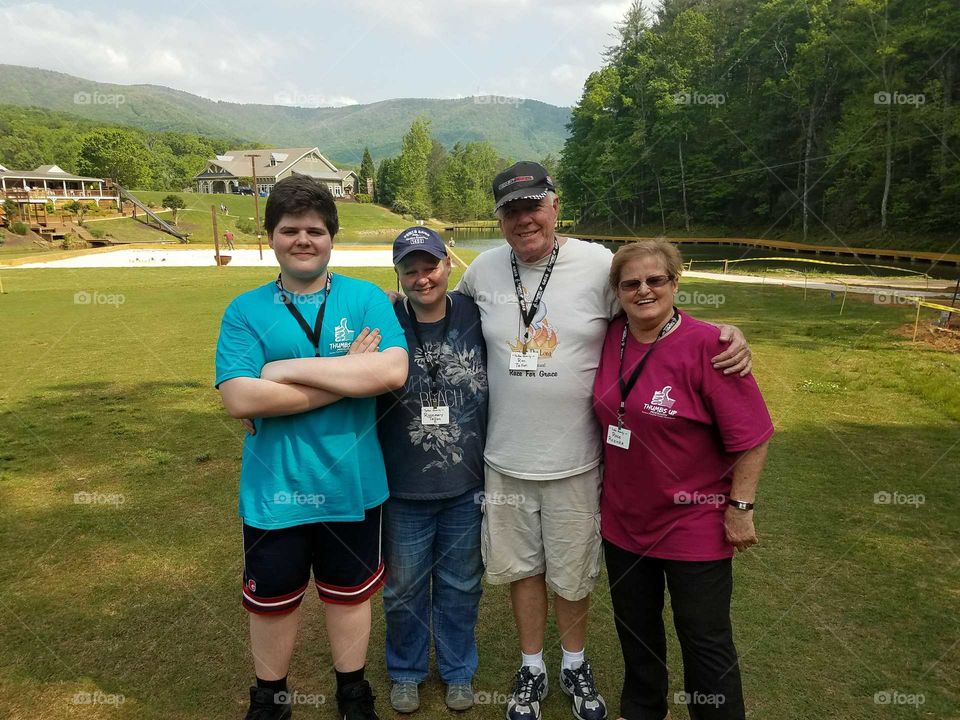My son, mother, husband and I at Thumbs Up Mission Cancer Retreat in Ellijay, GA