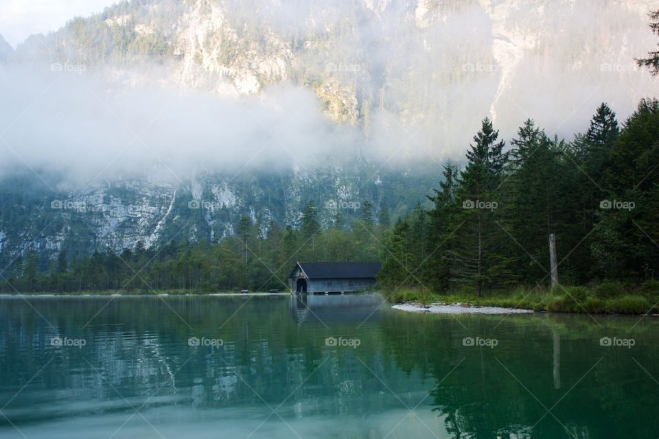 Fog on alpine lake