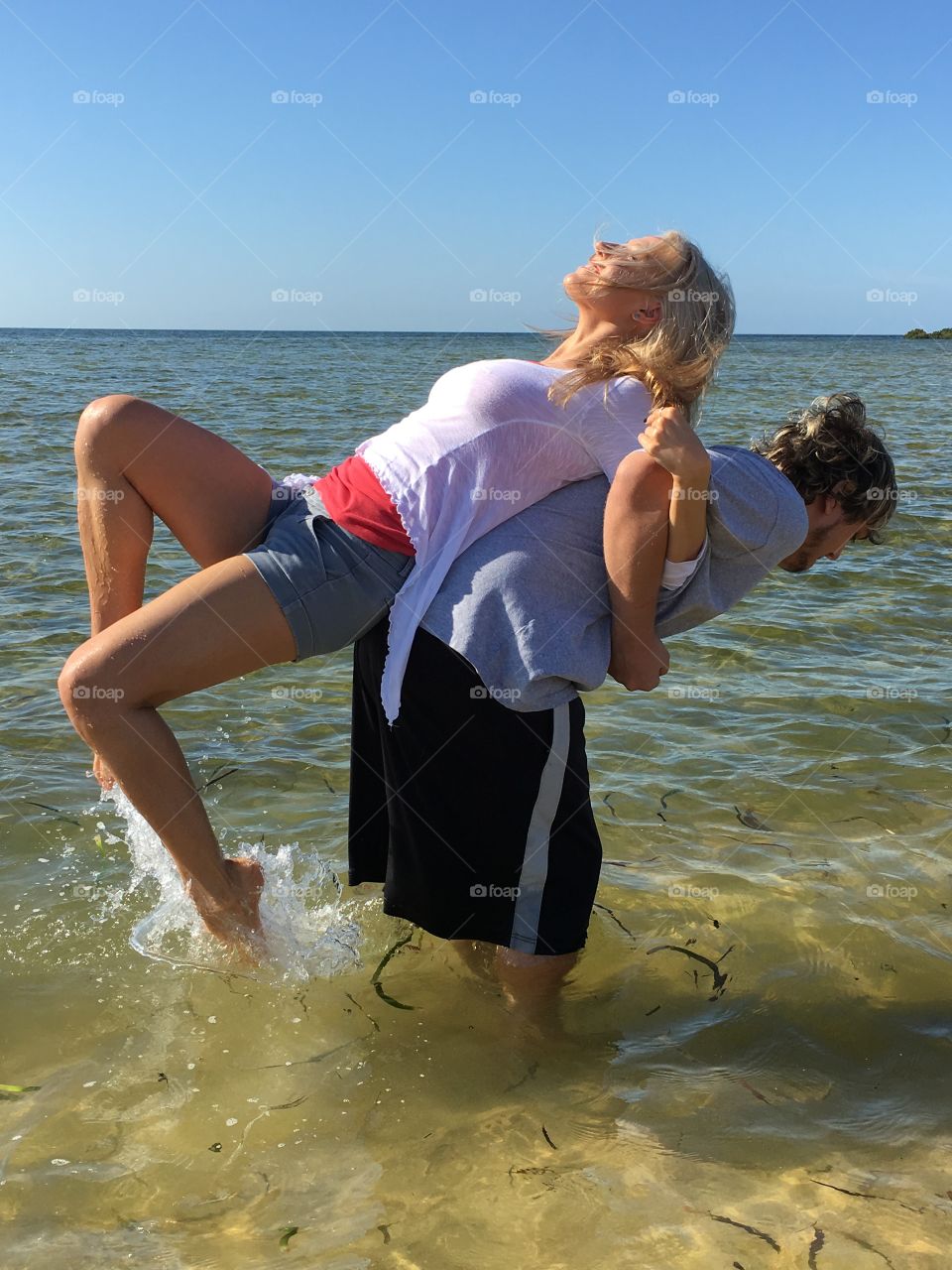 Couple having fun in sea