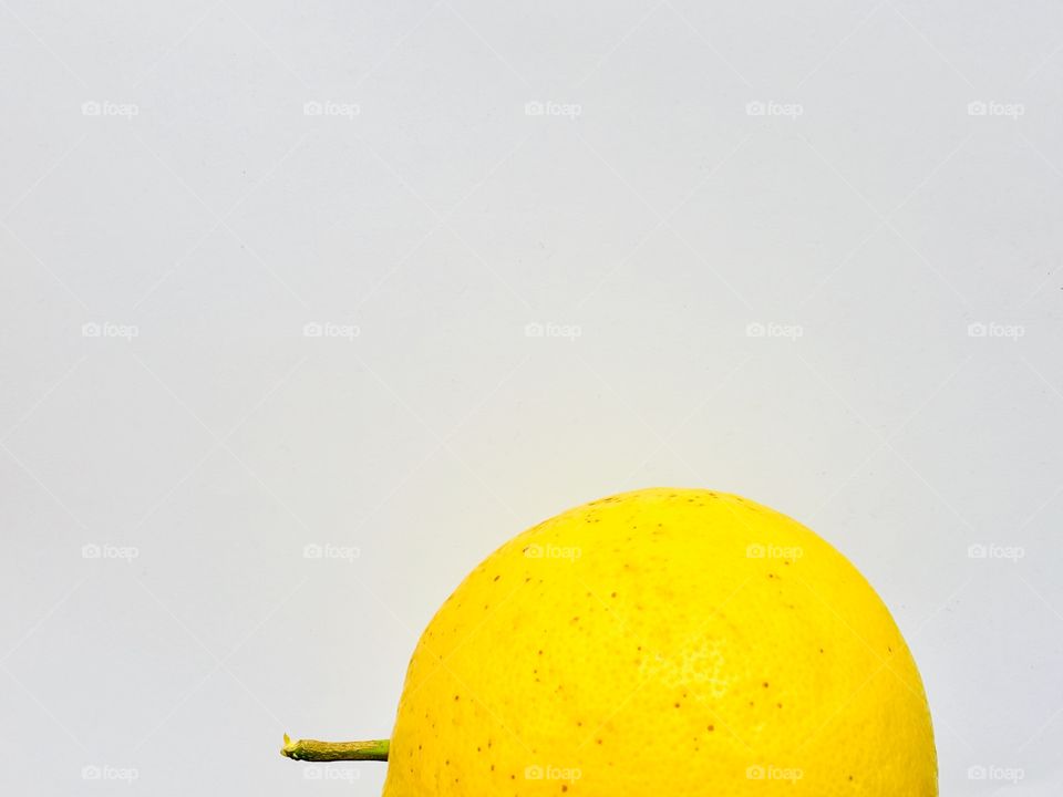 Orange in yellow stages isolated on light background, citrus copy space text space 