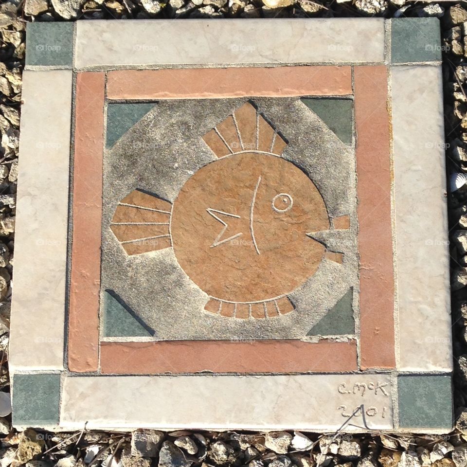 Fish mosaic stepping stone