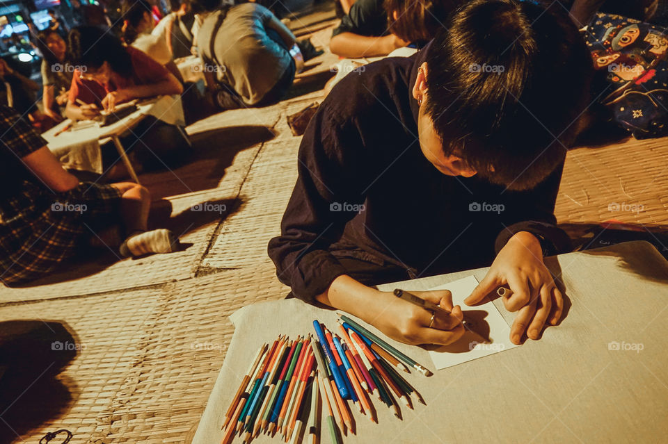Portrait drawing for an art class, Thailand 