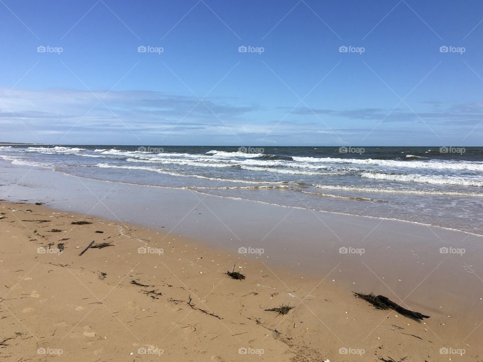 Lonely beach with waves