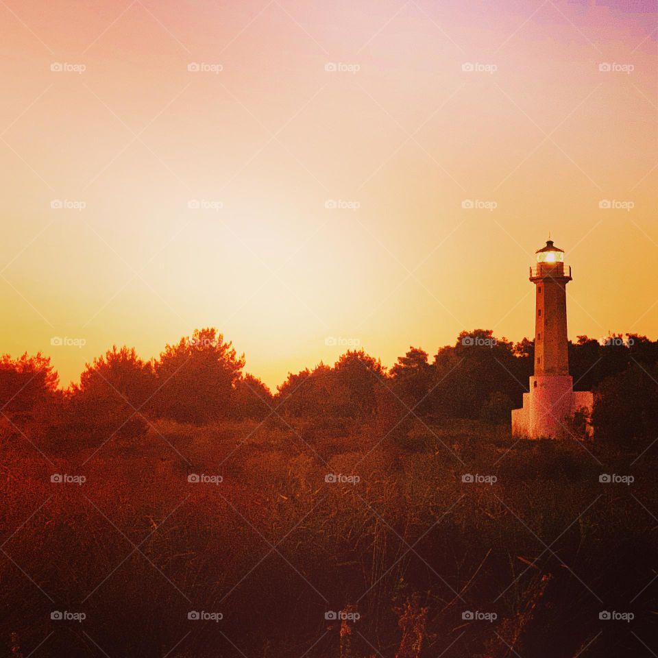 Sunset by the lighthouse