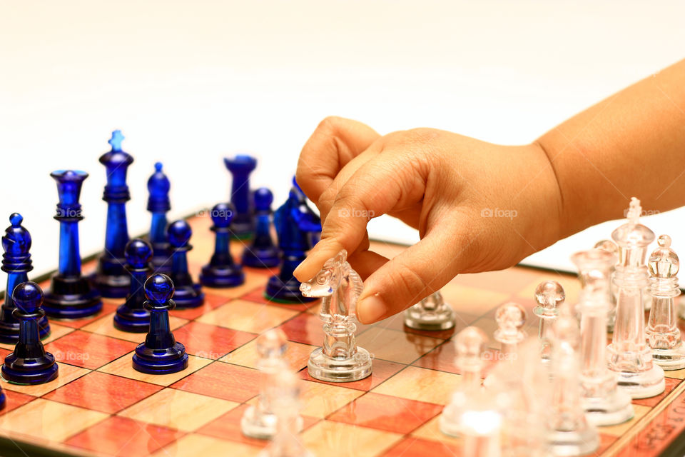 A little champ playing chess