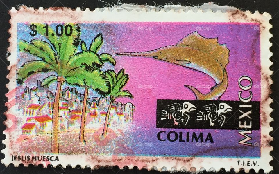 Mexican stamp of sail fish and palm trees Colima. Jesus muesca 