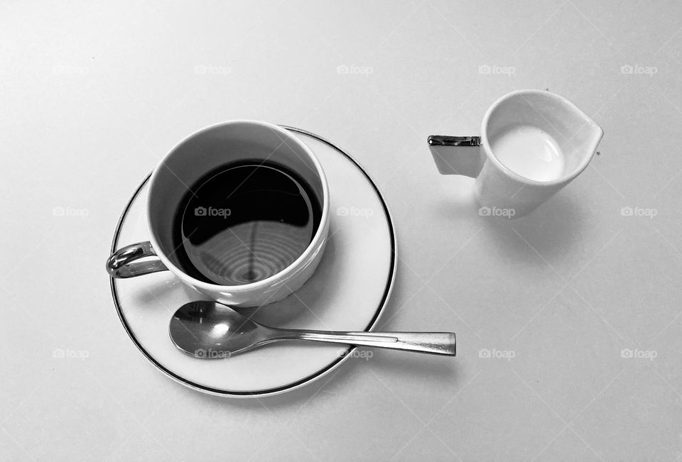 Coffee and cream on the table