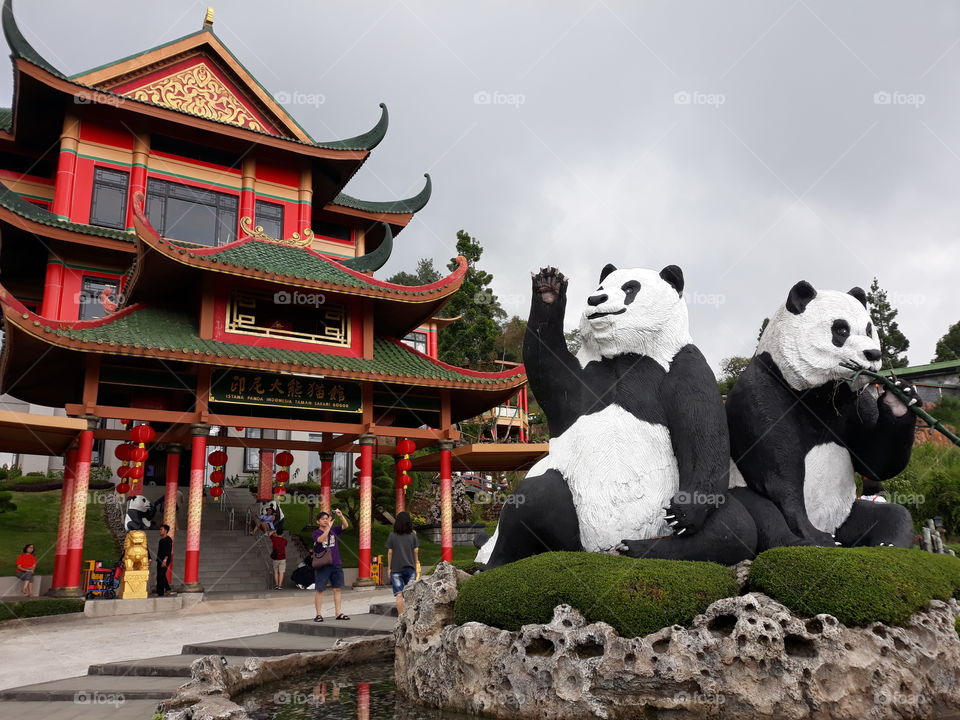 Magnificient Panda's palace in the gloomy cloud