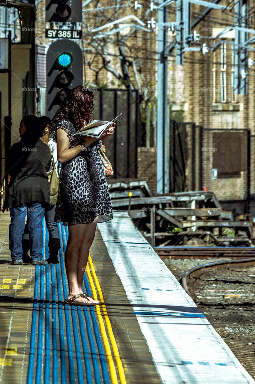 book train waiting line by laconic