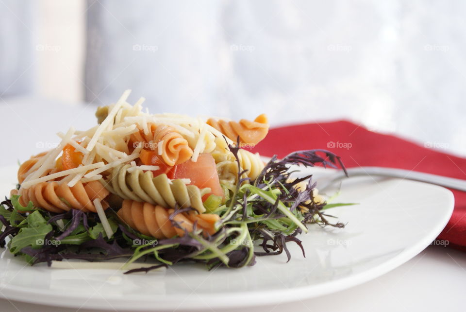 Close-up of pasta salad on plate