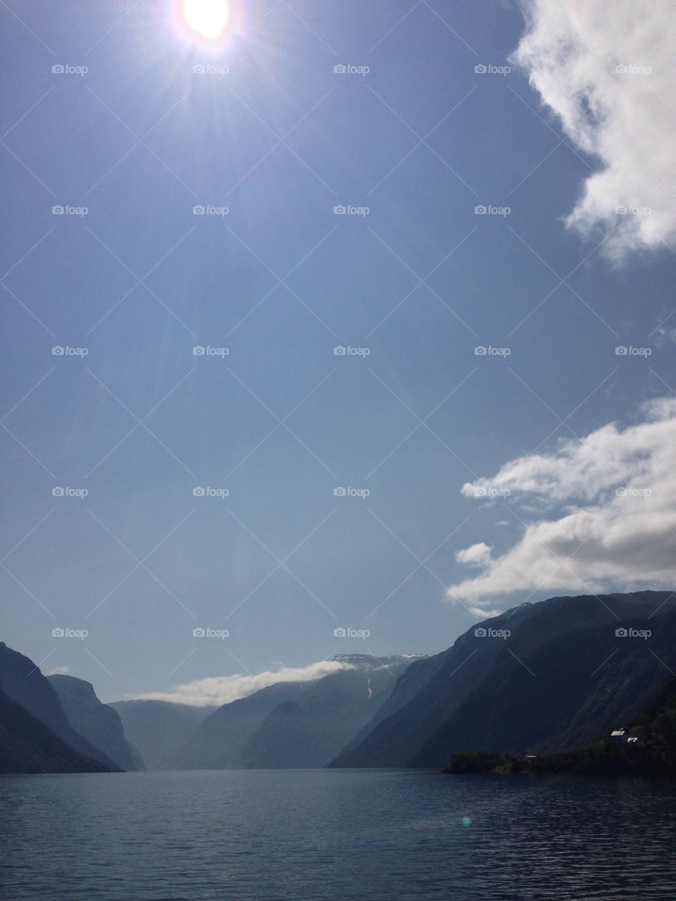 Sunlight over mountain, Fjord