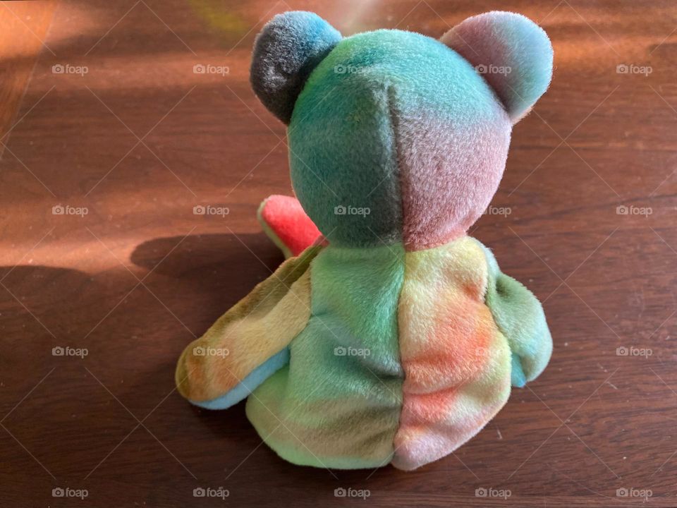 tie dye beanie baby bear sitting