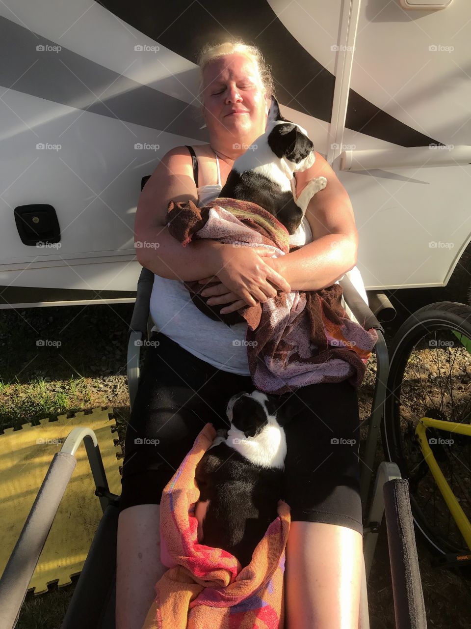 Camping with a rented RV this summer was so much fun. We took our bikes out for a ride to a local dog beach for a swim. Afterwards it was nap/cuddle time in the warm setting sun. So much fun & then so much relaxin!!! ๐