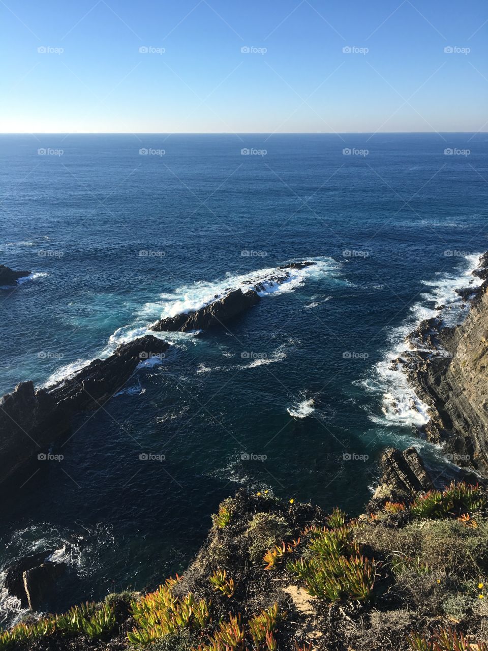 Cliffs and waves in Cabo Saldao Portugal 