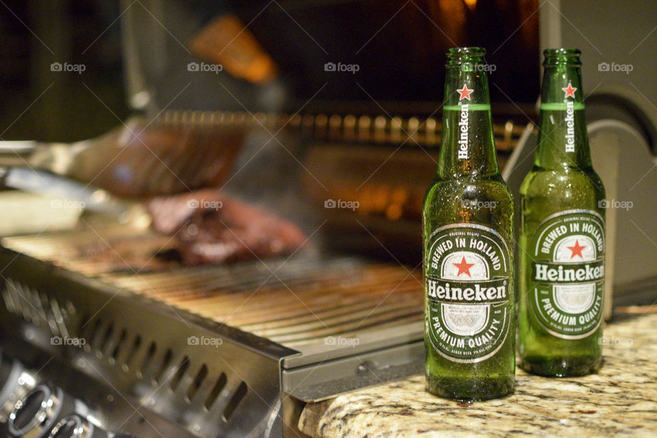 Two Bottles of Beer by the Grill 