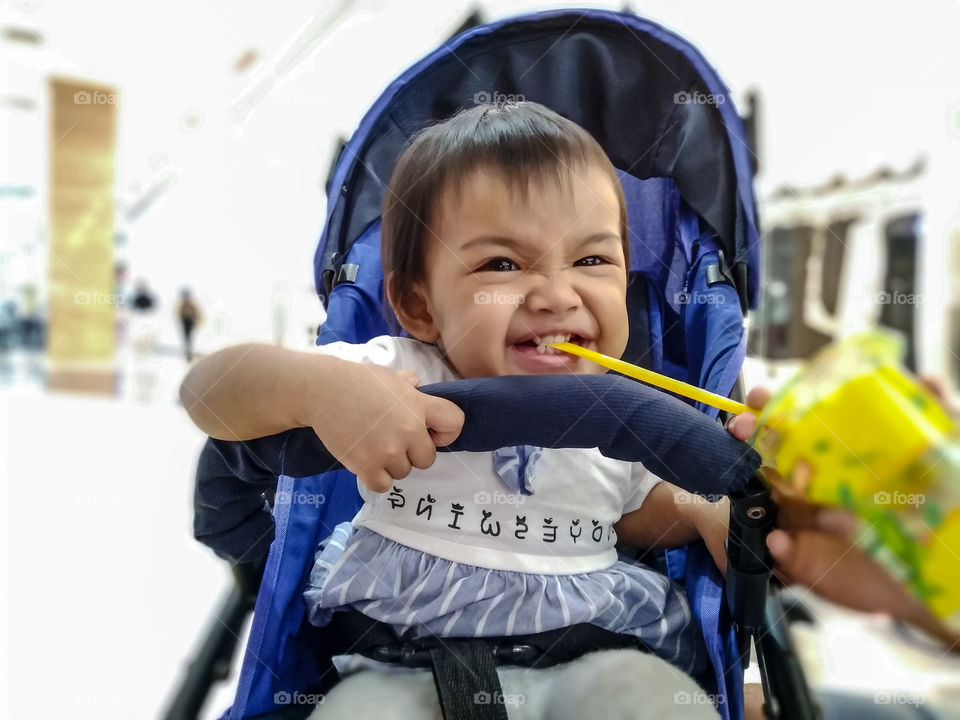 A little girl who really enjoyed her drink