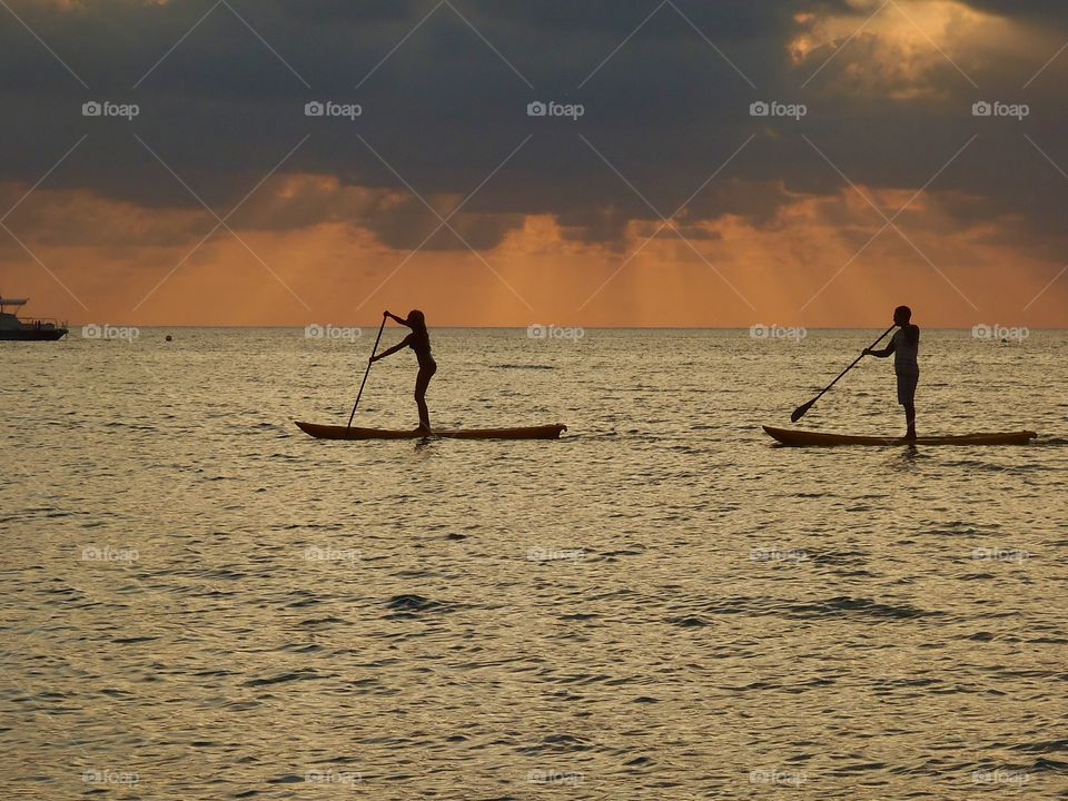 Sunset Paddle Boarding. Took this photo while paddle boarding with some friends.